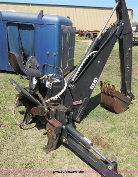 skid steer mounted backhoe